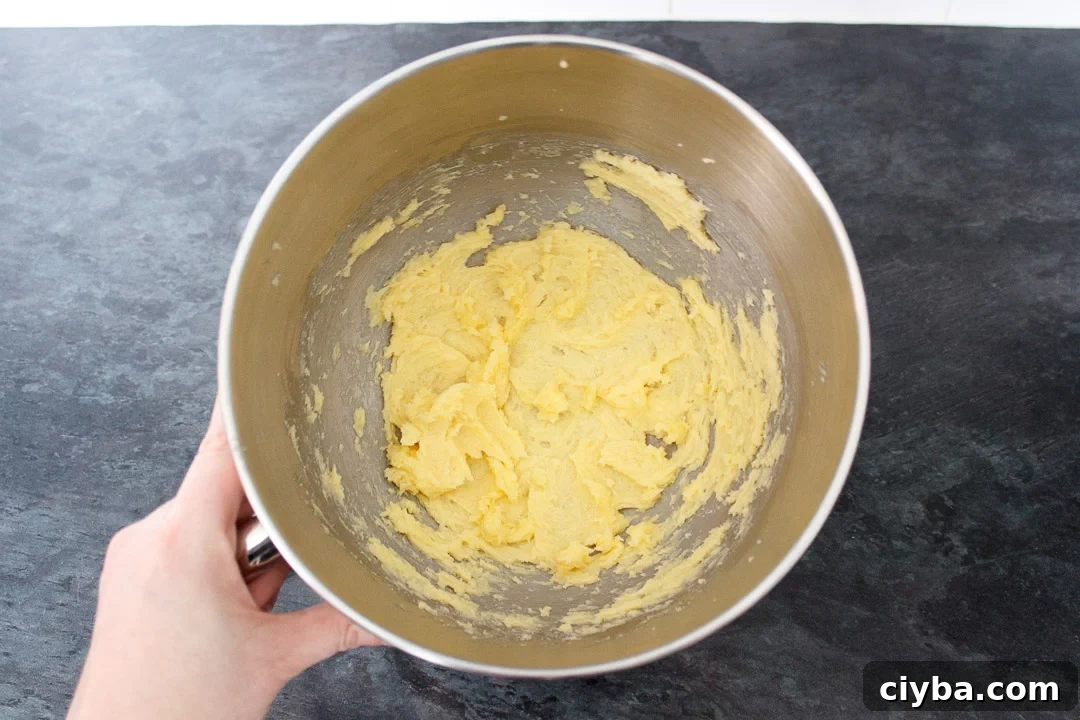 softened butter in the bowl of an electric stand mixer