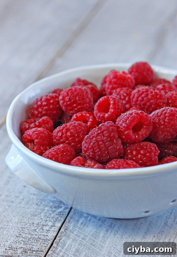 Chocolate Raspberry Almond Truffle Tart | From SugarHero.com