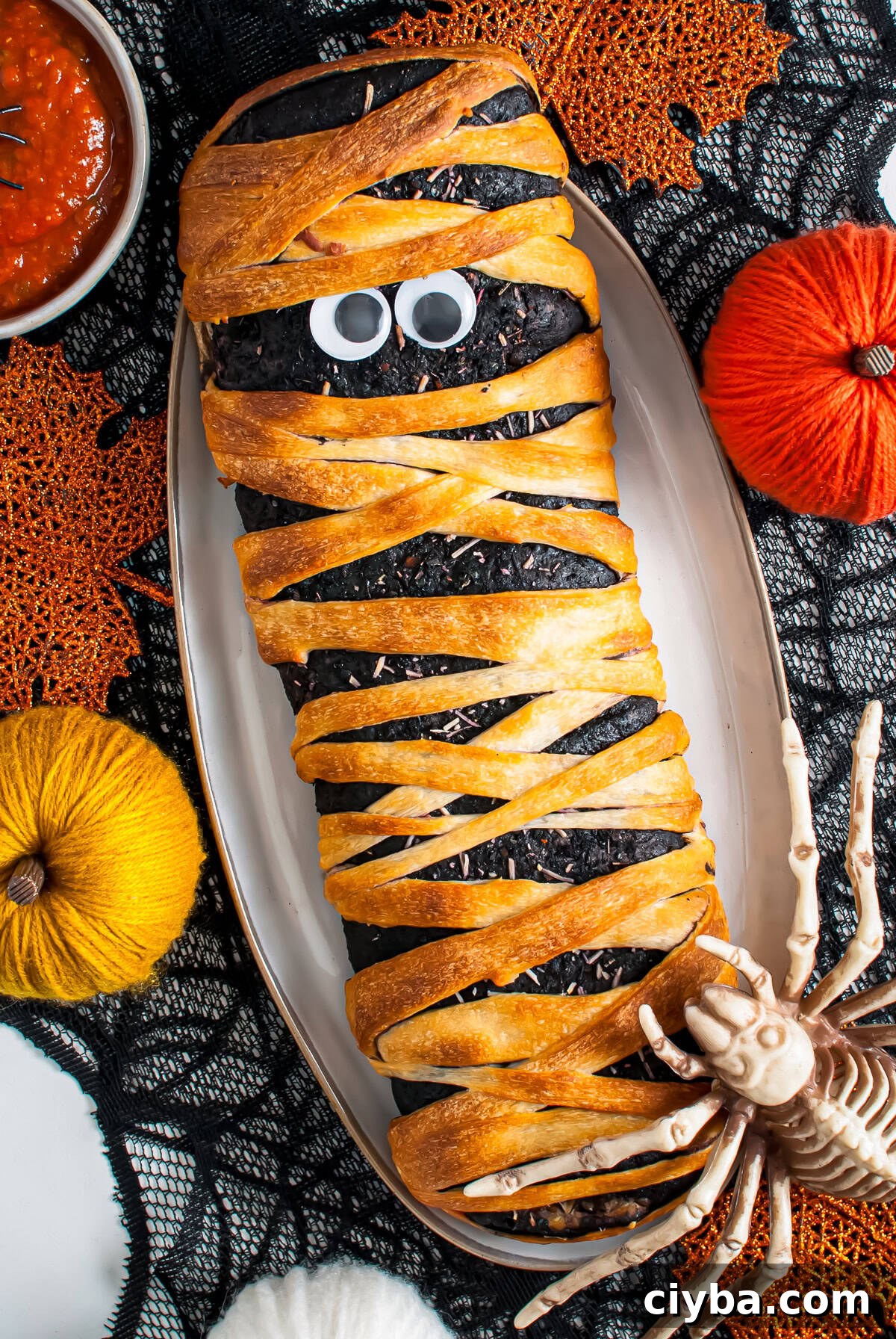 Finished Mummy Stromboli overhead showing eyes on platter.