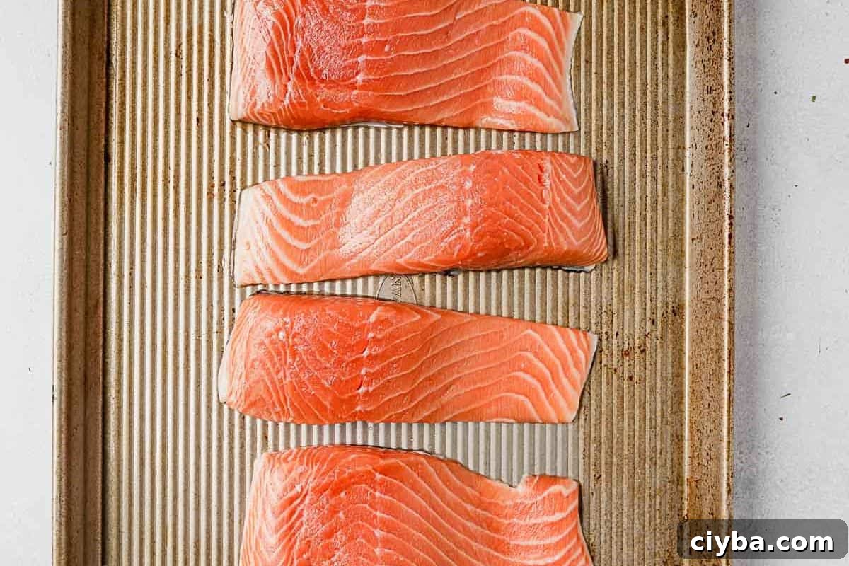 Salmon fillets on a baking sheet