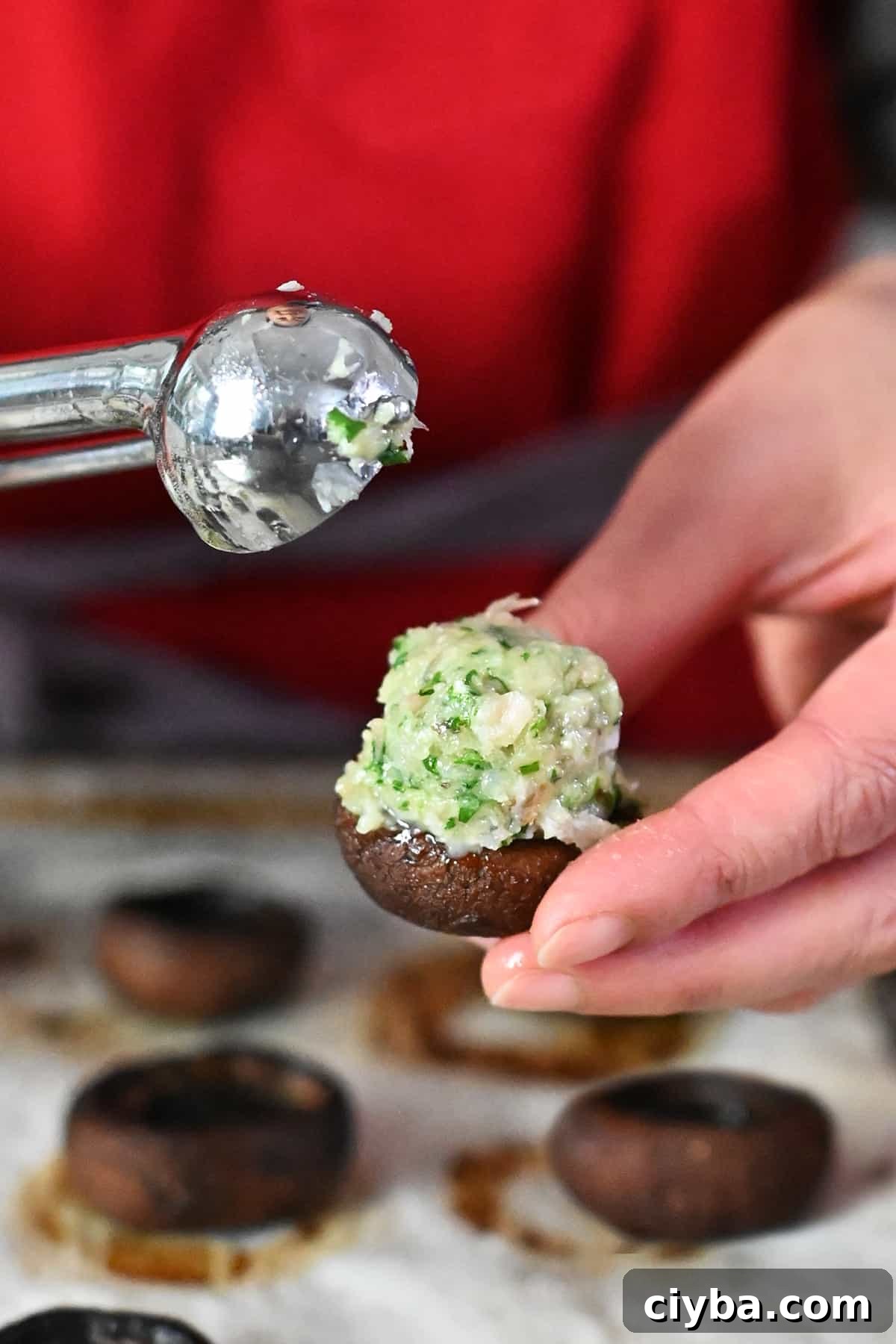 Close-up of shrimp-stuffed mushrooms ready to go in the oven.
