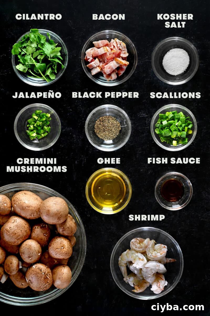 An overhead shot of the raw ingredients to make paleo and keto shrimp stuffed mushrooms.