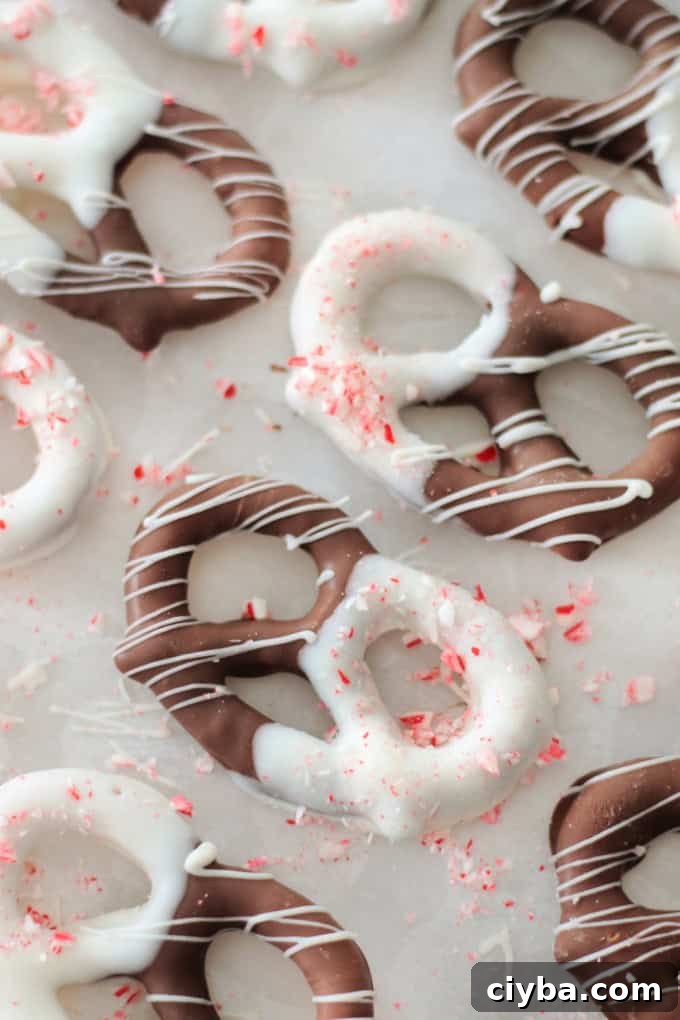 peppermint bark pretzels on parchment paper