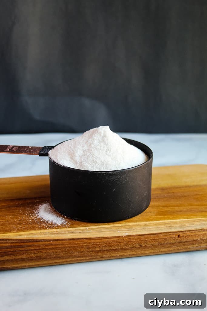 measuring cup of white rice flour.