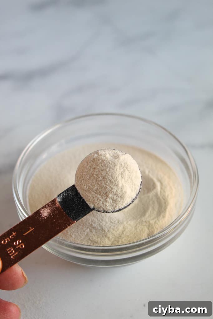 up close shot of xanthan gum in a spoon
