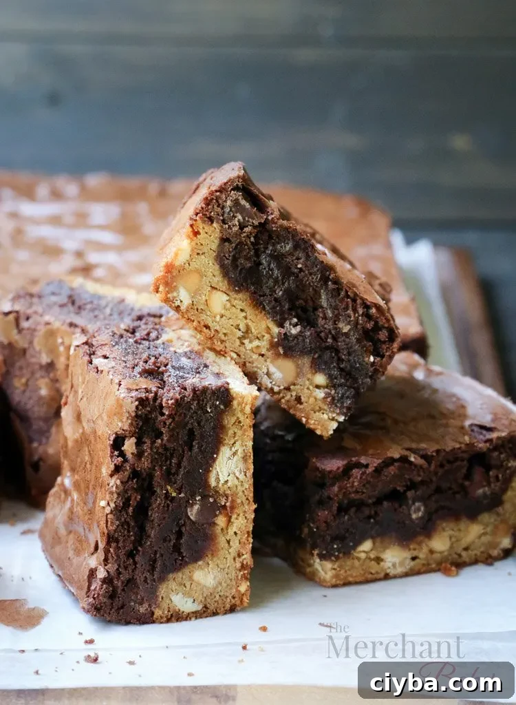 Chewy Peanut Butter Blondie Brownies 3 Side view of three Peanut Butter Blondie Brownies squares