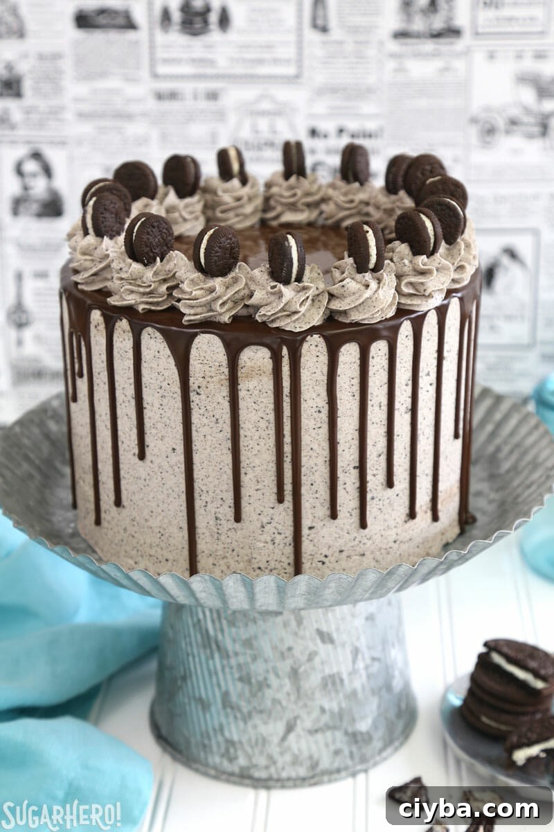 Cookies and Cream Cake - tall layer cake on a silver cake stand