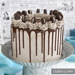 Cookies and cream cake on a silver cake stand