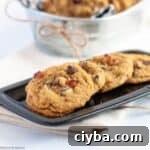Gluten-free pumpkin pecan cookies lined up on a plate.