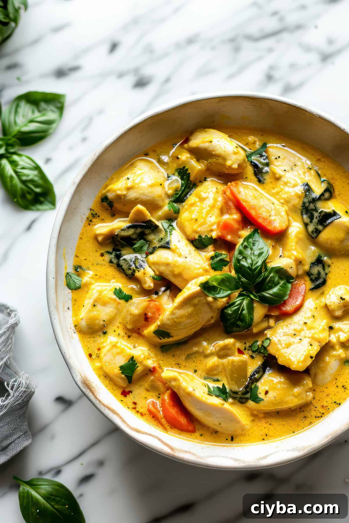 Easy Thai yellow chicken curry with rice and vegetables.