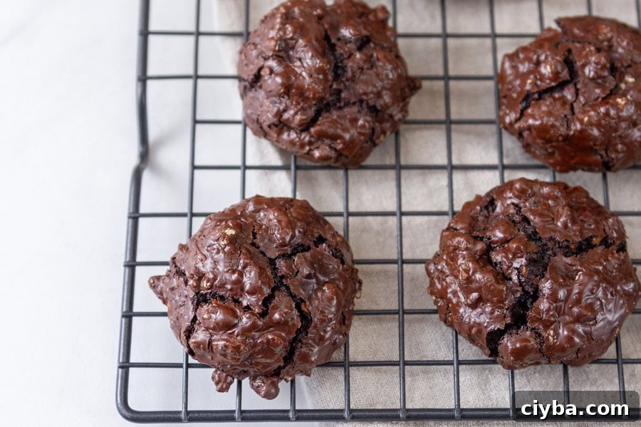 chocolate cookies on a wire cooling rack.