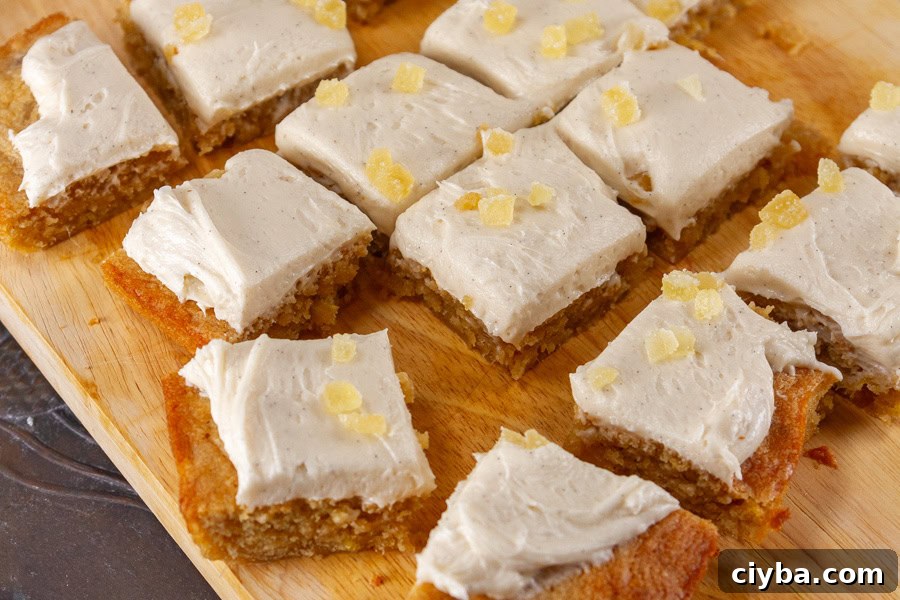 horizontal crop of dessert cookie bars on a wooden cutting board.