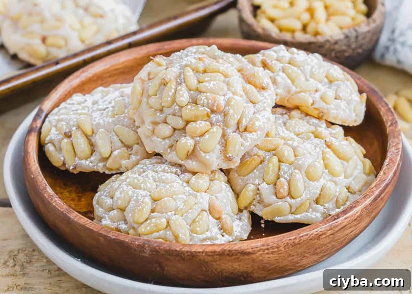 A wooden bowl filled with cookies.