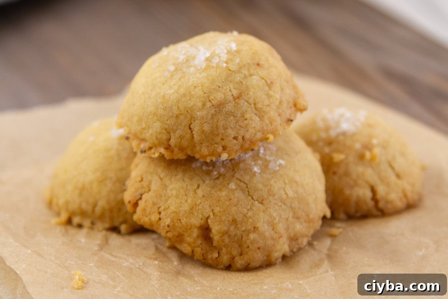 cookies in a stack on parchment paper.
