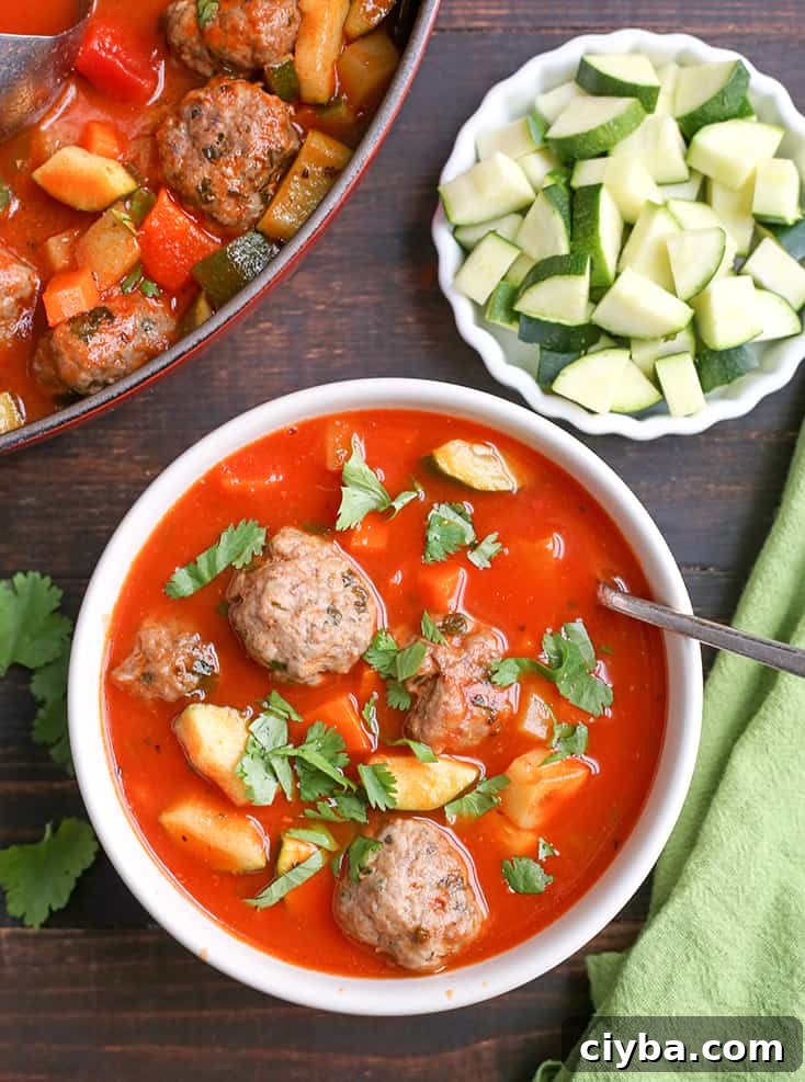 This Paleo Whole30 Mexican Meatball Soup is flavorful, packed with veggies, and so delicious! Gluten free, dairy free, egg free and nut free.