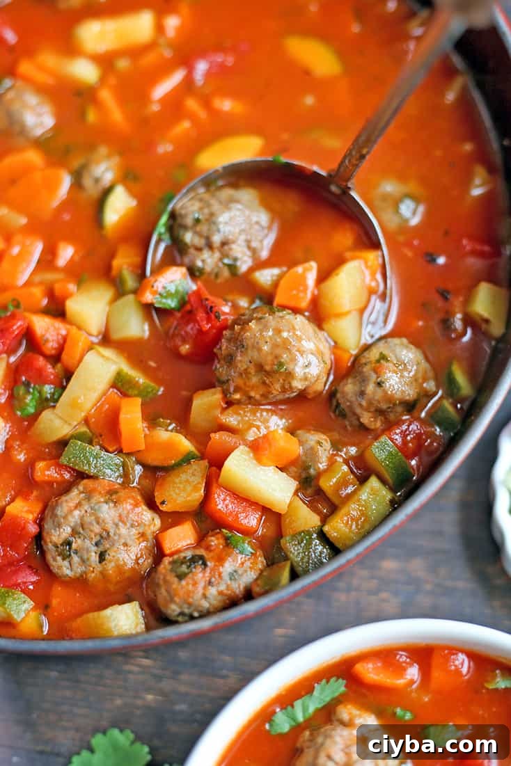 This Paleo Whole30 Mexican Meatball Soup is flavorful, packed with veggies, and so delicious! Gluten free, dairy free, egg free and nut free.