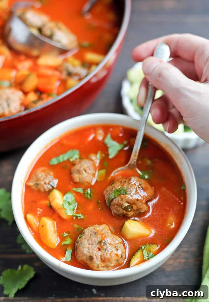 This Paleo Whole30 Mexican Meatball Soup is flavorful, packed with veggies, and so delicious! Gluten free, dairy free, egg free and nut free.