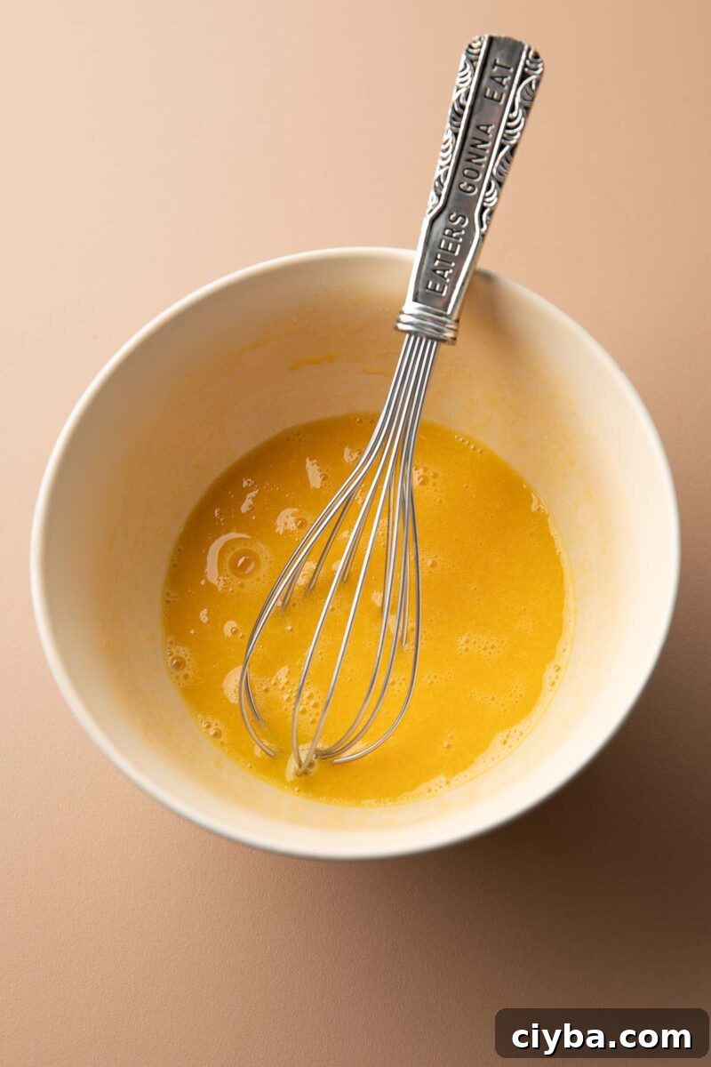 Matzo Balls Recipe: Classic, Light & Fluffy 6 matzo balls step 1 - whisk together eggs and oil