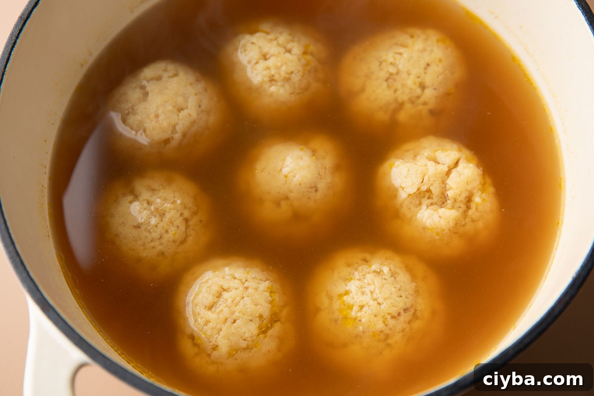 Matzo Balls Recipe: Classic, Light & Fluffy 10 cooked matzo balls in broth