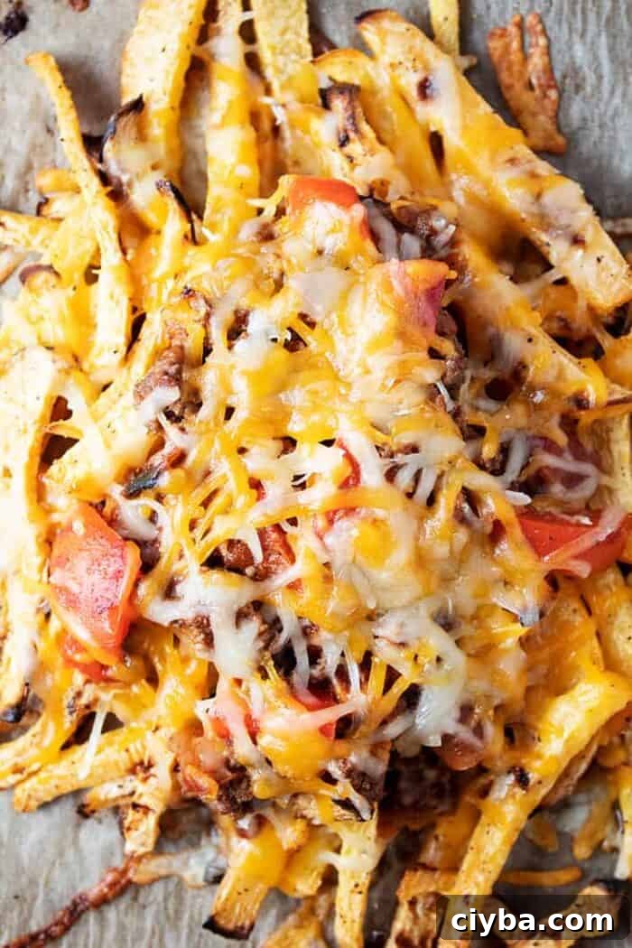 Keto Super Bowl Party Menu: Low-Carb Game Day Recipes 40 overhead view of keto chili cheese fries with melted cheese