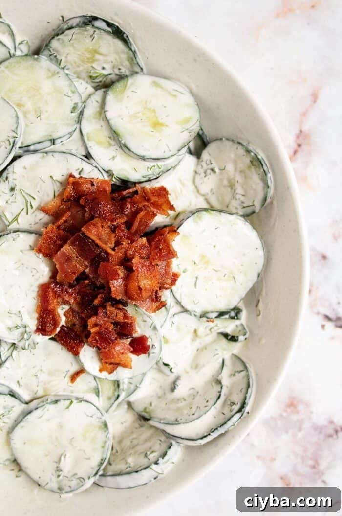 Keto Super Bowl Party Menu: Low-Carb Game Day Recipes 41 overhead view of keto cucumber salad with crumbled bacon on top