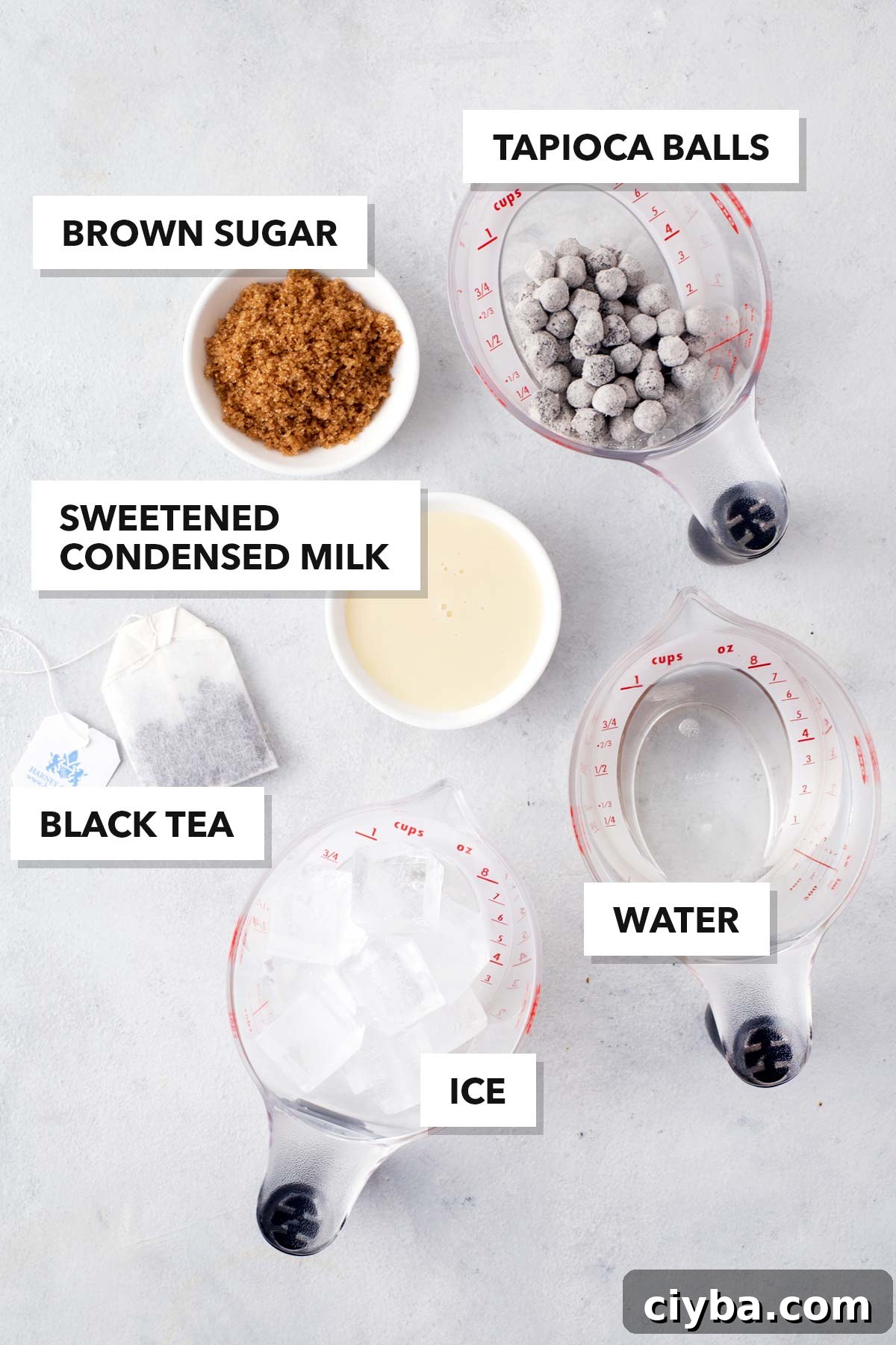 Hong Kong Bubble Tea ingredients measured in cups and labeled on a table.