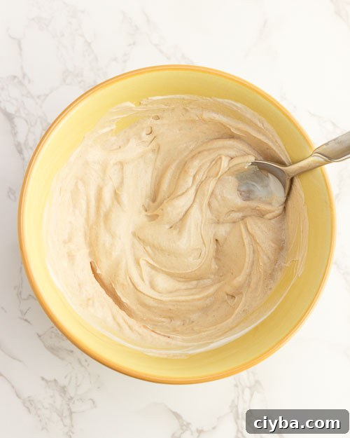 Mixing the peanut buttter yogurt.