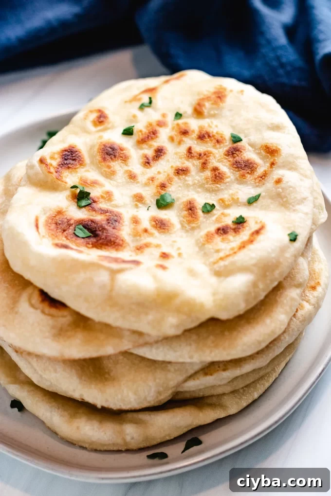 A stack of sourdough naan.