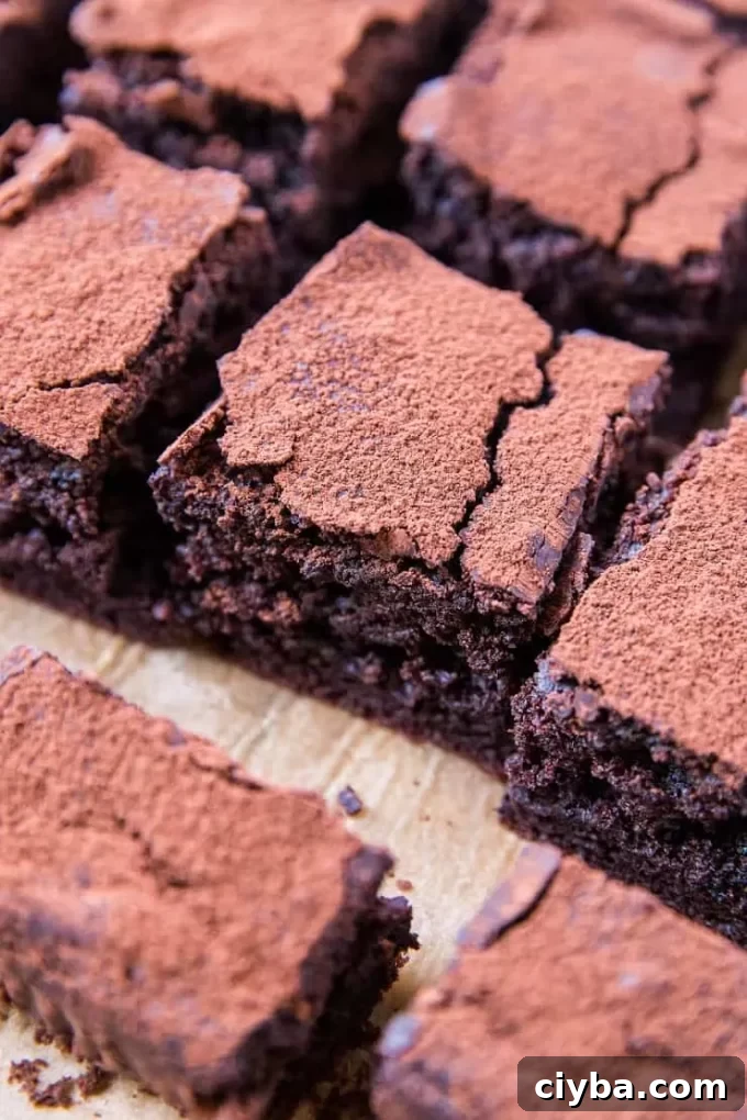 Sourdough chocolate cake sliced on a surface.