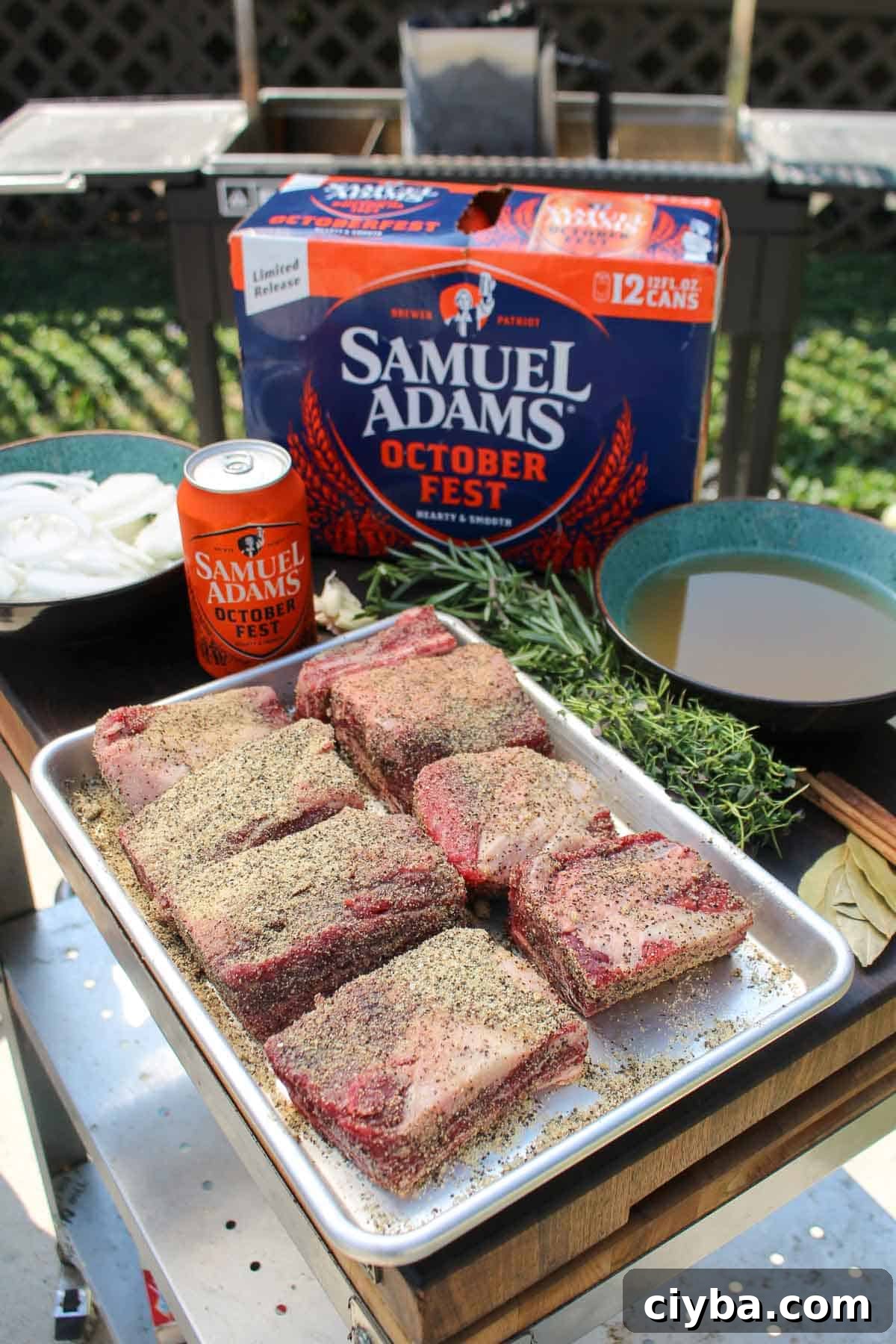 The short ribs are seasoned before grilling. 