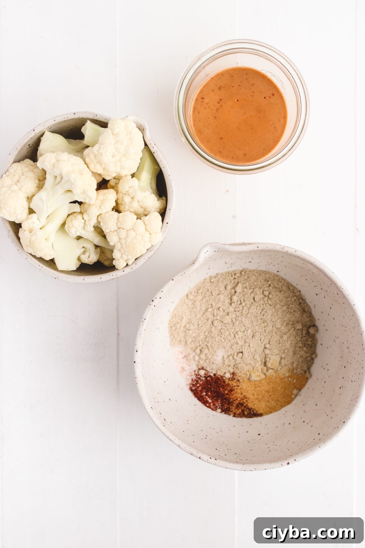 Crispy Vegan Buffalo Cauliflower Wings Recipe 3 recipe ingredients in small bowls