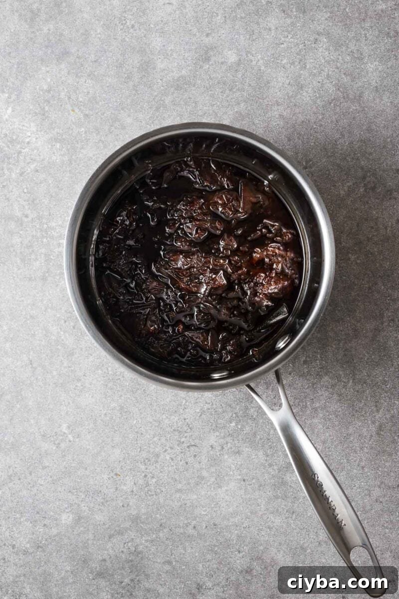 A saucepan with katsuobushi, kombu, sake, mirin and soy sauce that simmered for five minutes.