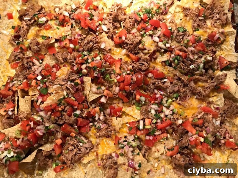 Seriously Amazing Pork and Party Pico Nachos | SavorwithJennifer.com