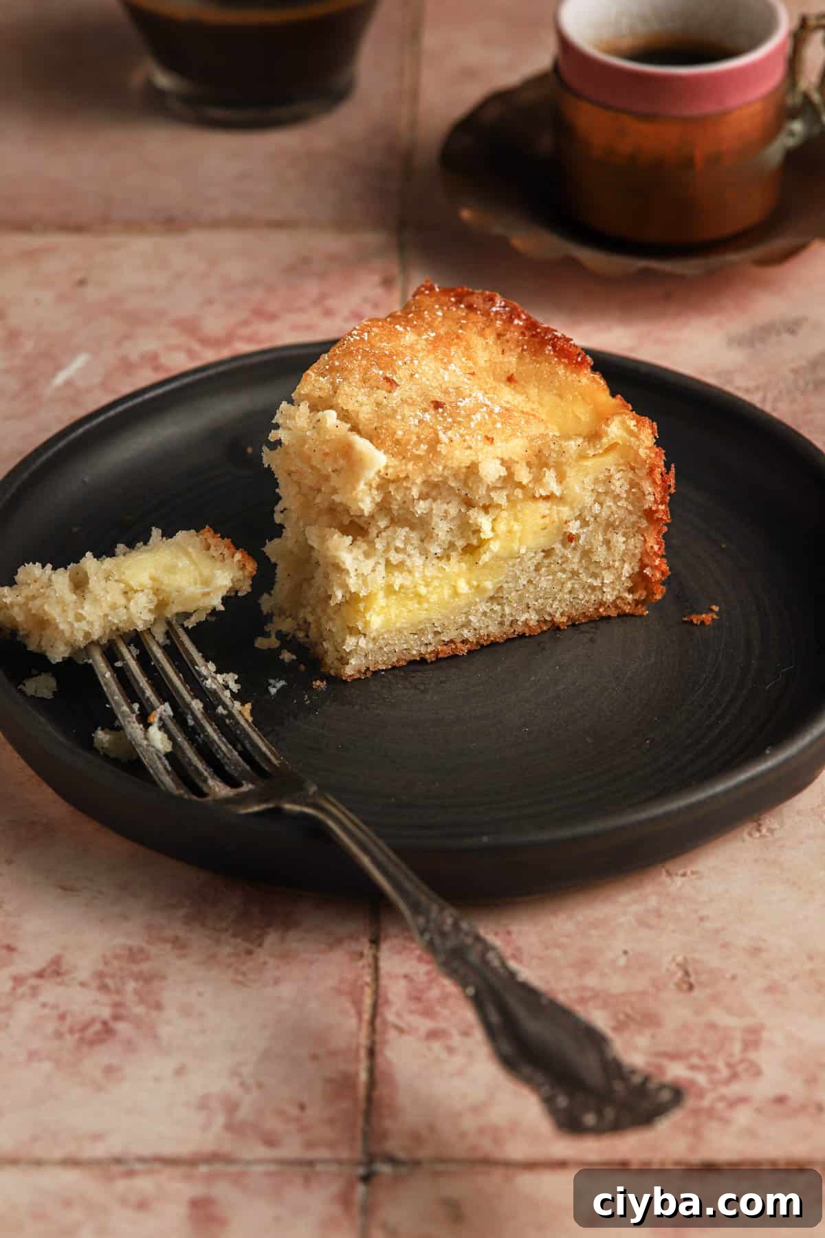 a slice of torta nua on a plate with a fork.