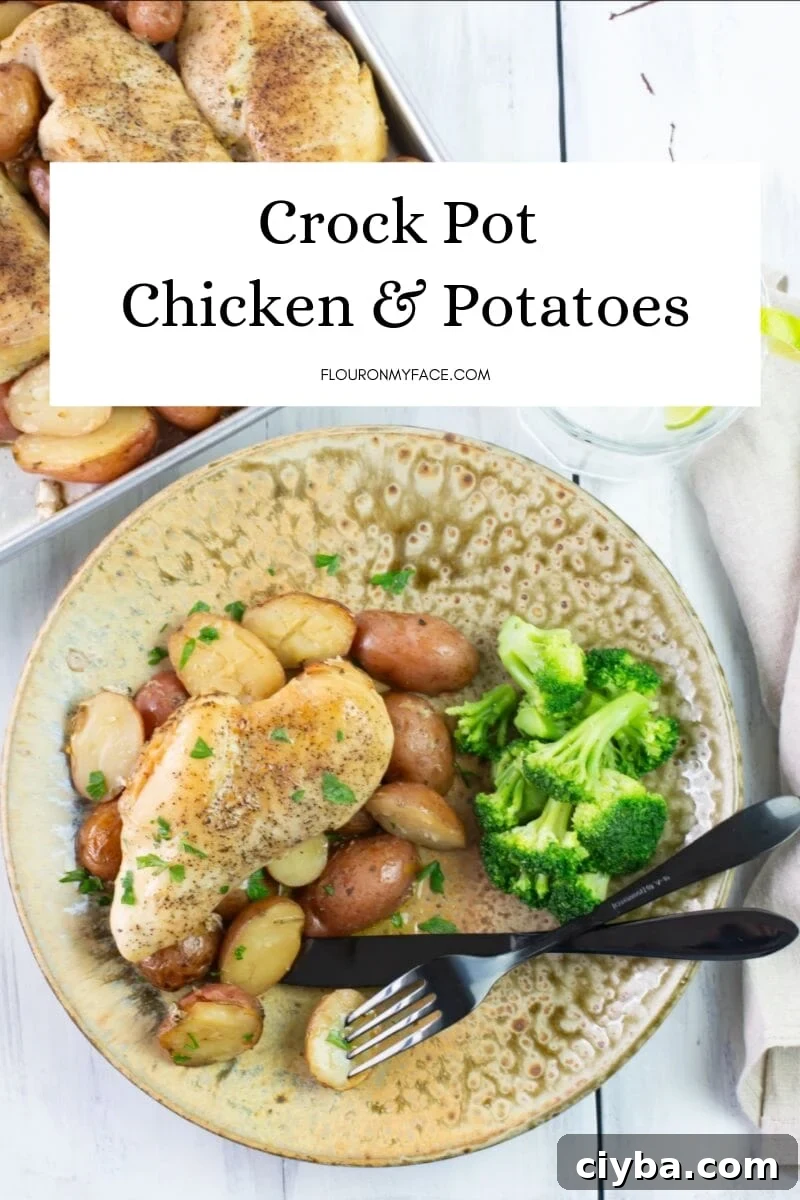 Slow Cooker Chicken and Potatoes with Garlic and Herbs 3 a tan pottery dinner plate with a serving of herbed potatoes, a boneless chicken breast and a serving of steamed broccoli