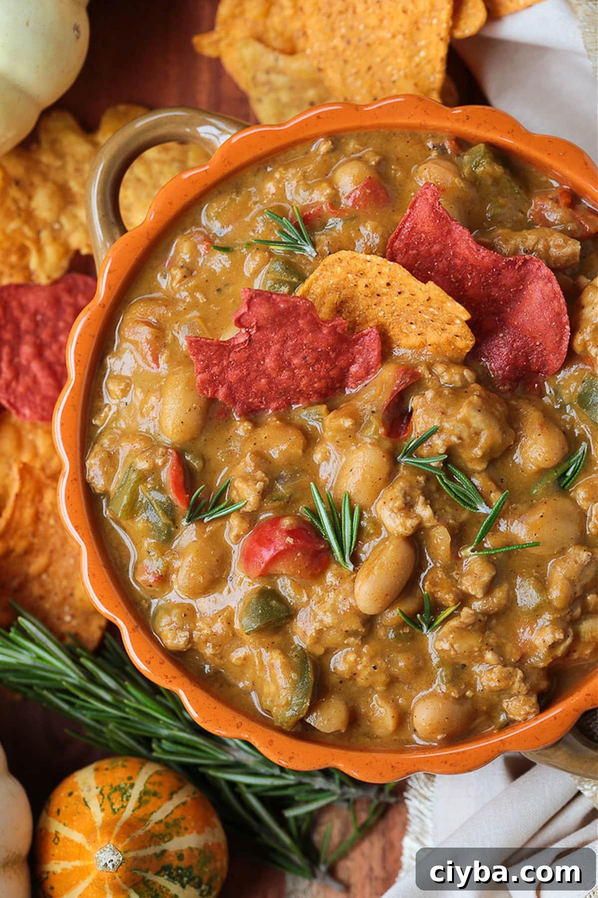 turkey pumpkin chili in orange bowl with tortilla chips