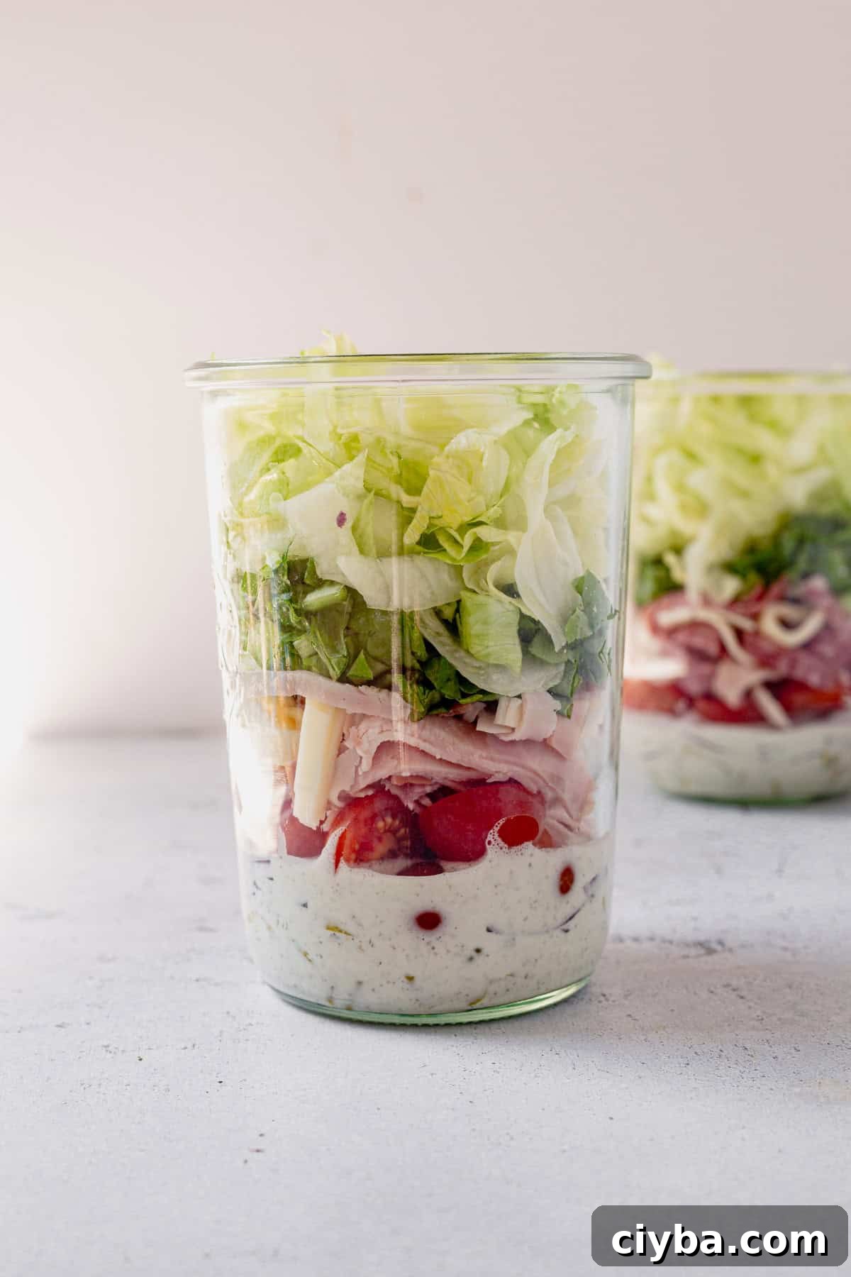Italian Grinder Salad with Salami, Provolone & Vinaigrette 6 grinder salad in a glass jar