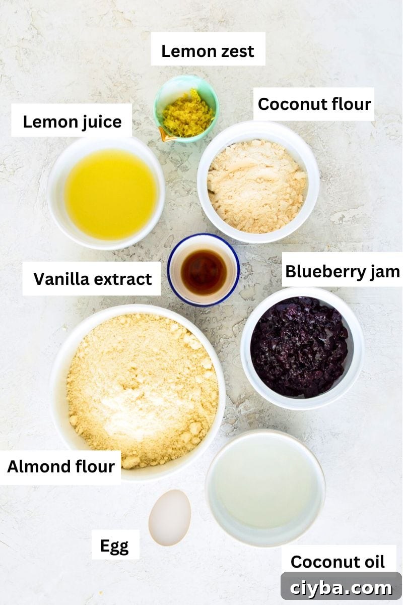 The ingredients needed to make gluten free lemon pop tarts separated into bowls including almond flour, lemon zest, lemon juice, coconut flour, tapioca flour and coconut oil.