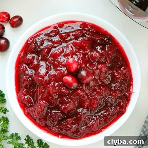 Cranberry sauce in a white bowl.